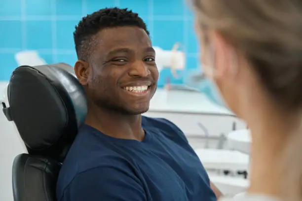 Patient receiving hygienist treatments