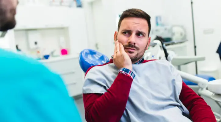 Patient receiving emergency dental care